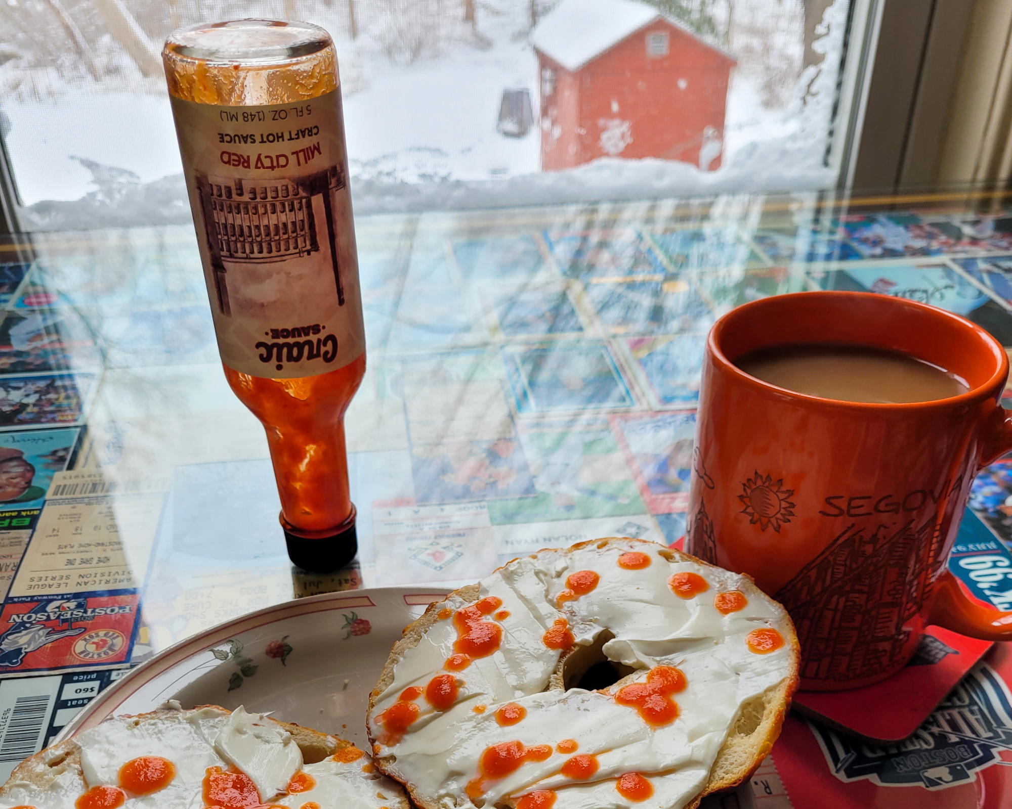 hot sauce and food combination with bagel