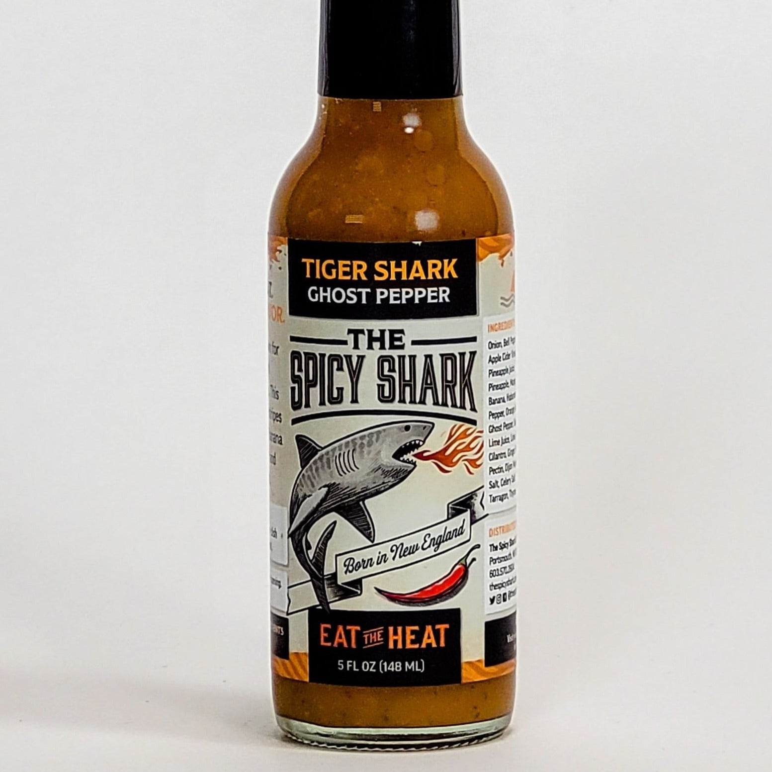 https://crafthotsauce.com/cdn/shop/products/the-spicy-shark-tiger-shark-ghost-pepper-label_2000x.jpg?v=1646060186